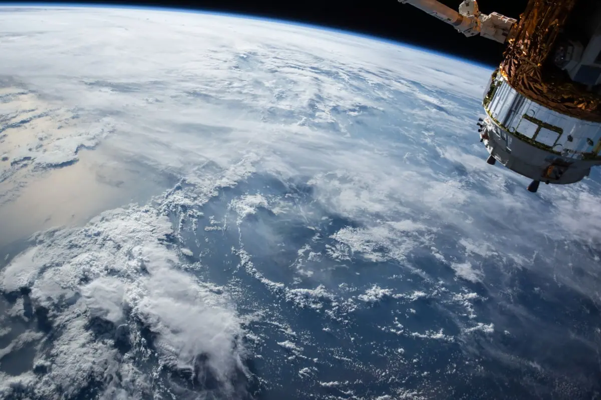 A stunning view of Earth from space, representing the orbital neighborhood where Asteroid 2026 JH2 will make its close approach.