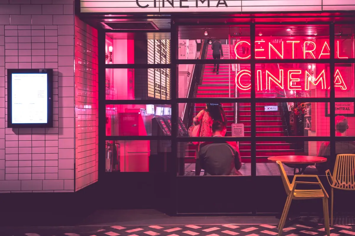 Empty red cinema seats suggesting theatrical spy franchises—not official 007 branding or stills.