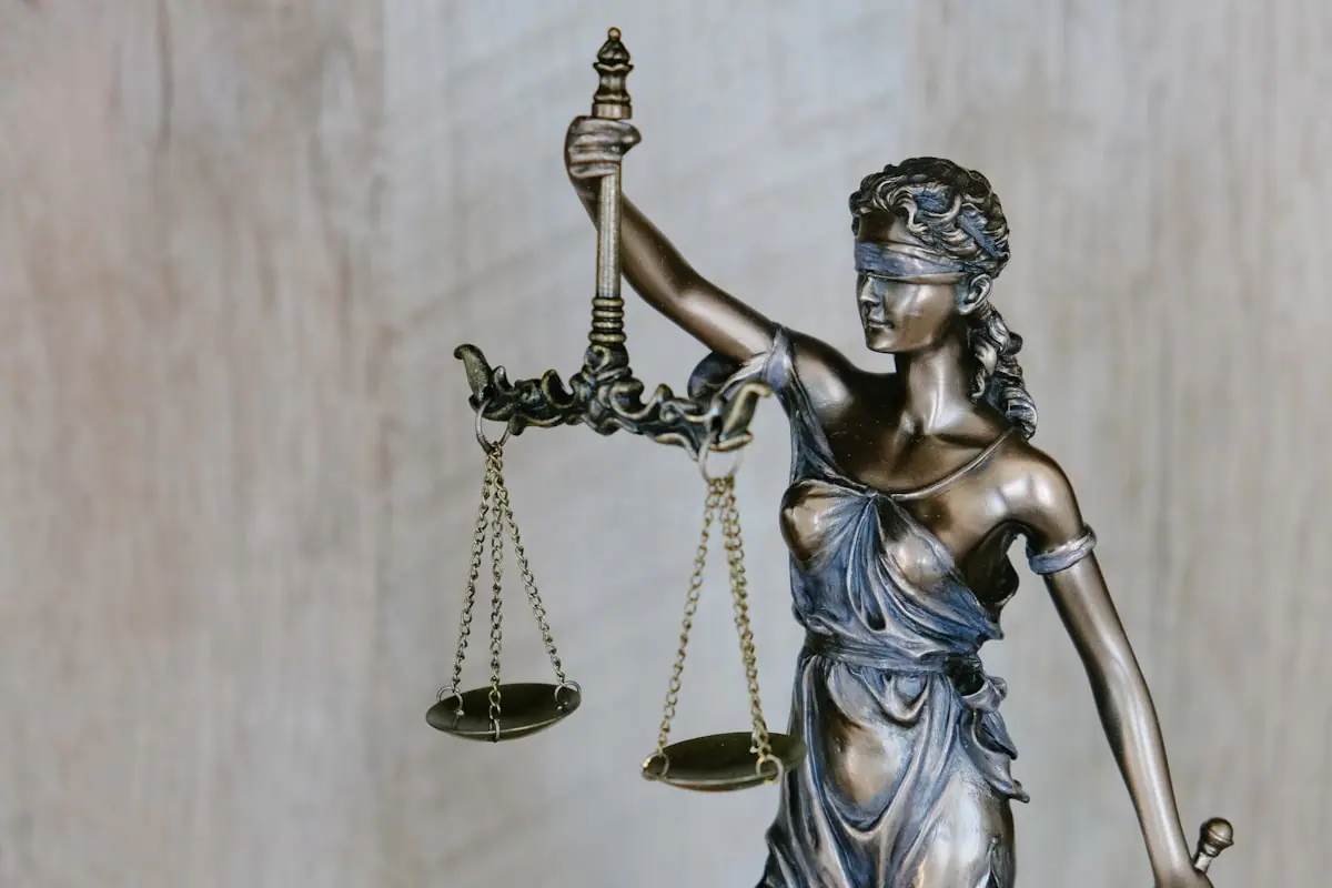 Court gavel on wood suggesting a federal judicial order—not a portrait of any party or judge named in the case.